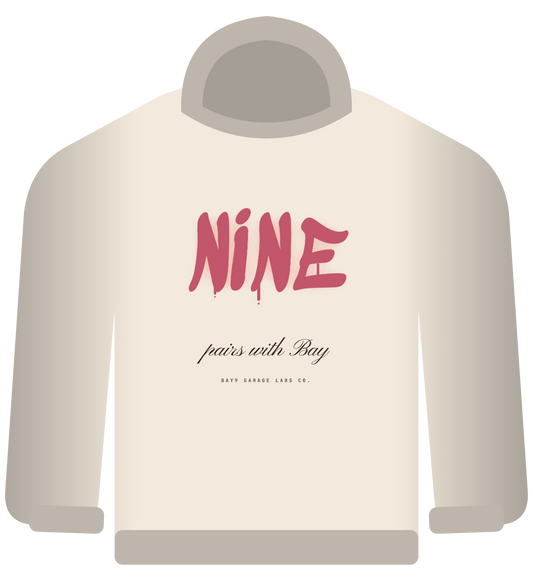 NINE hoodie, cream, rose graffiti NINE with drips and pairs with Bay script